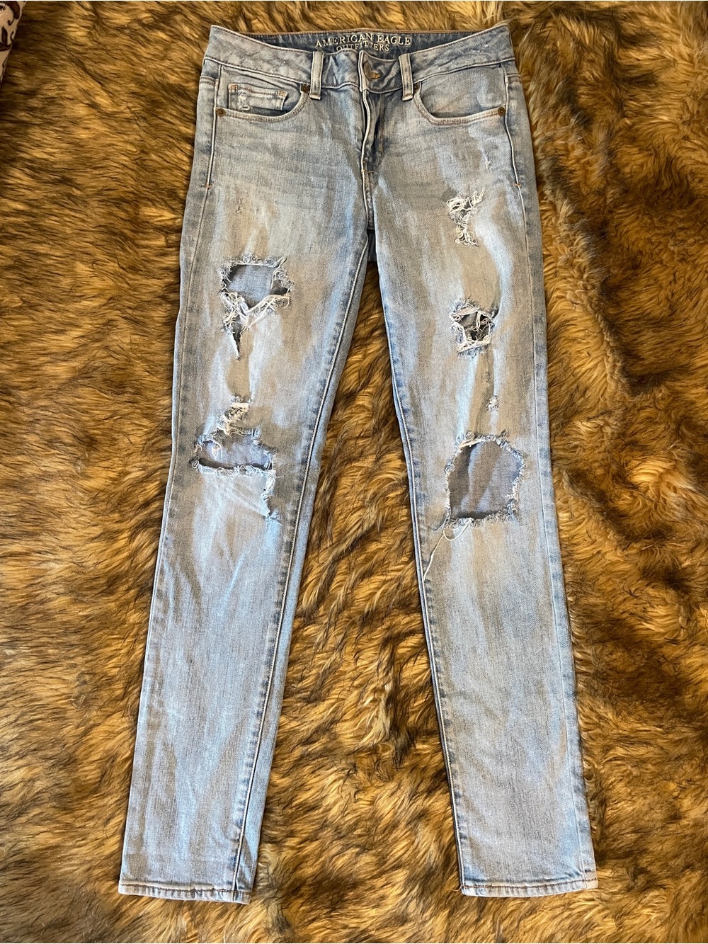 AEO Light Blue Distressed Skinny Jeans